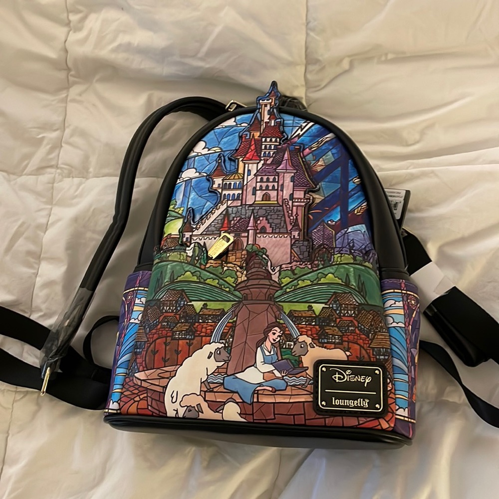 Never used Loungefly Beauty and the Beast tags still on